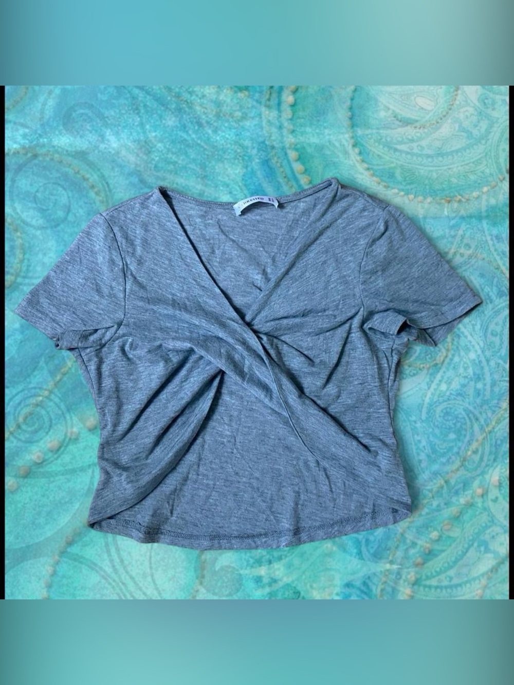 Grey t shirt top with twist in the front